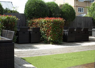 Outdoor terrace with dark wicker furniture
